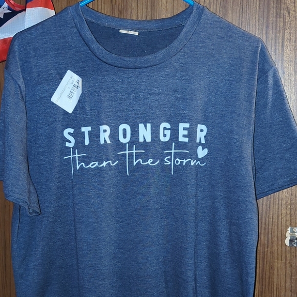 Temu Tops - Stronger Than the Storm Heather Blue Tee